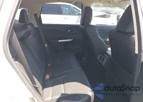 2015 Honda Cr-V Touring z USA, uszkodzony, nr VIN 5J6RM4H92FL116338